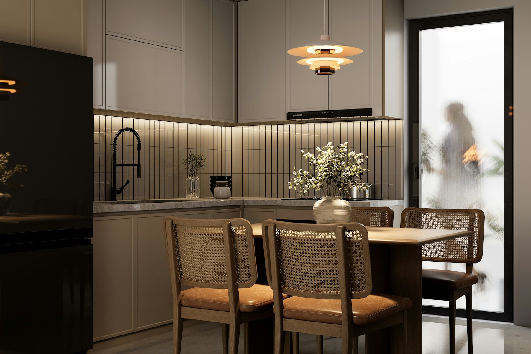 A warm modern dining room and kitchen in a private apartment